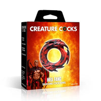 Creature Cocks Hell Fang Silicone Cock Ring by XR featuring a demon-inspired red-and-black design, soft stretchy premium silicone, a 1.1" unstretched inner diameter, and 2.4" overall height.