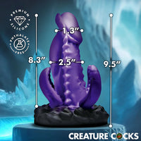 Purple silicone product with measurements against a blue, icy background, featuring 'Creature Cocks' branding.