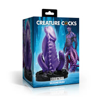 Boxed silicone dildo with octopus design, branded 'Creature Cocks', on a white background.