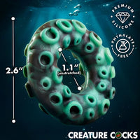 Creature Cocks Octo-Grip Silicone Cock Ring by XR featuring a deep-sea tentacle-inspired texture, soft stretchy premium silicone, a 1.1" unstretched inner diameter, and 2.6" overall height.