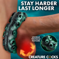 Creature Cocks Octo-Grip Silicone Cock Ring by XR featuring a deep-sea tentacle-inspired texture, soft stretchy premium silicone, a 1.1" unstretched inner diameter, and 2.6" overall height.