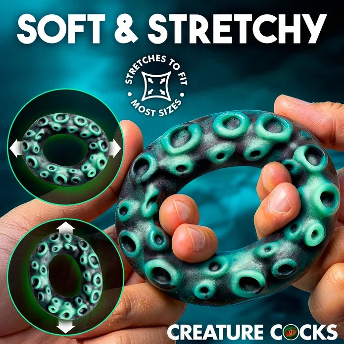 Creature Cocks Octo-Grip Silicone Cock Ring by XR featuring a deep-sea tentacle-inspired texture, soft stretchy premium silicone, a 1.1" unstretched inner diameter, and 2.6" overall height.