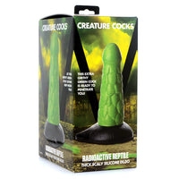 green reptile looking dildo