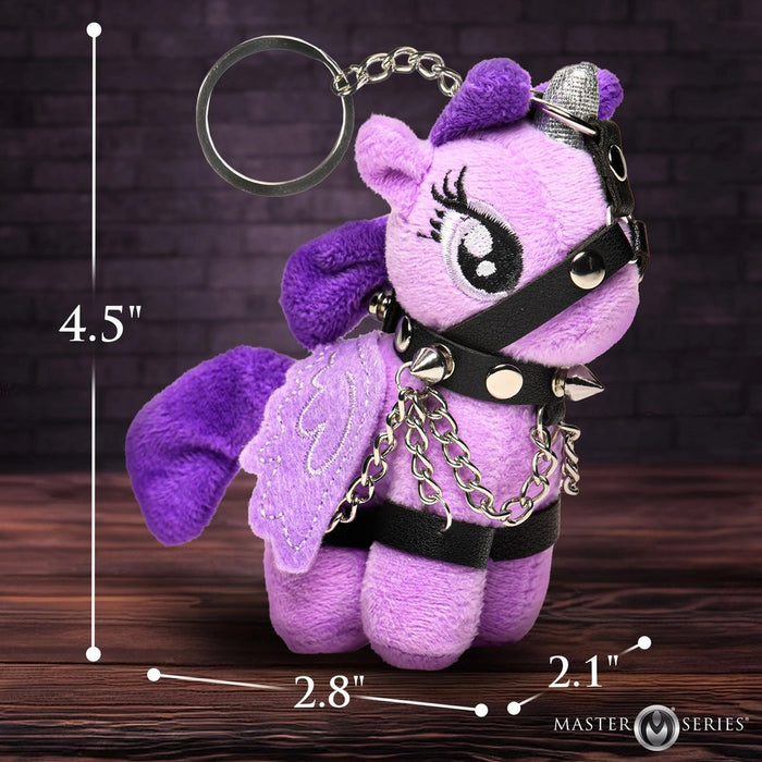 Purple plush keychain with measurements on a wooden surface