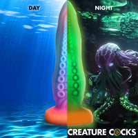 multi colored tentacled dildo in day and night light