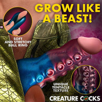 Advertisement for a soft and stretchy ball ring with tentacle texture, labeled 'Grow Like a Beast' and featuring 'Creature Cocks' branding.