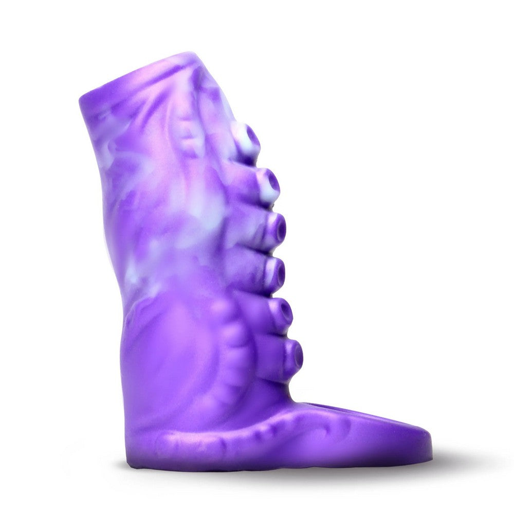 A purple silicone boot-shaped adult novelty item with a textured, embossed design, shown in profile against a white background.
