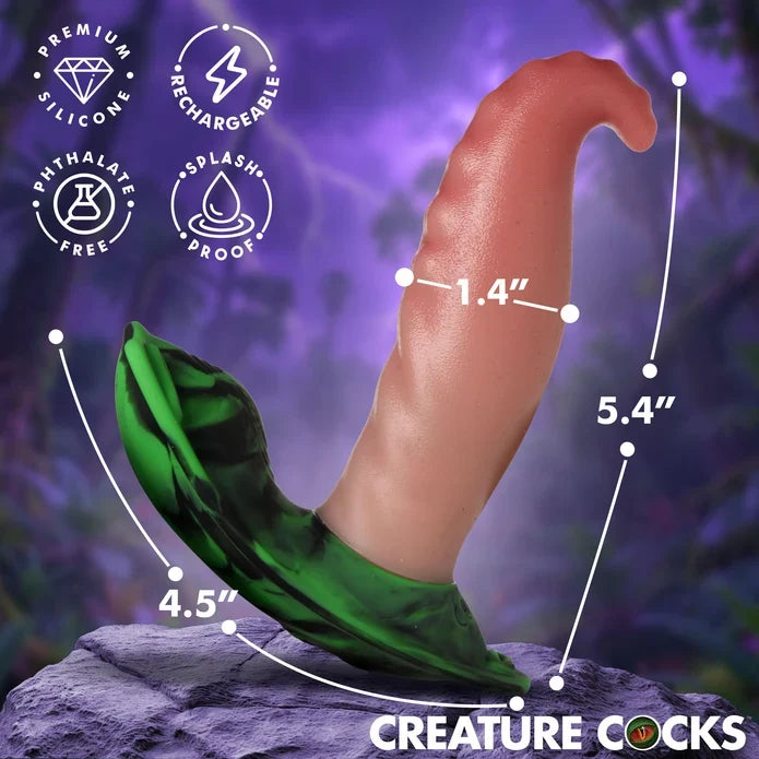 A novelty product labeled 'Creature Cocks' shown on a purple fantasy-style background with measurement lines and text indicating dimensions: 1.4 inches height, 5.