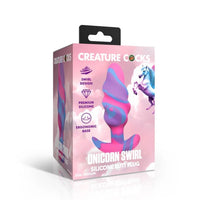 pink, purple and blue swirl anal plug with bottom base