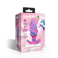 pink, purple, blue swirl anal plug with bottom base