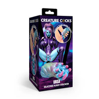 multi colored alien claw vagina masturbator on box