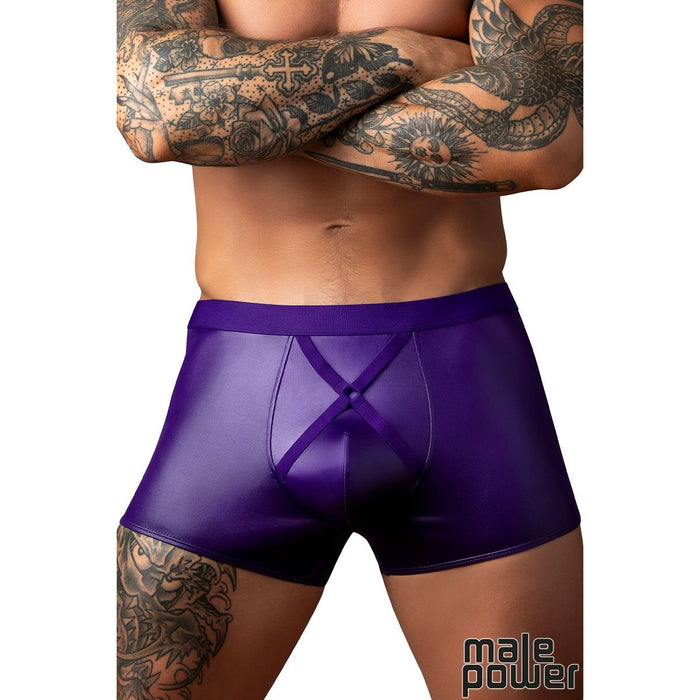 Person wearing purple underwear with a white background