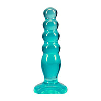 Turquoise crystal jellies anal delight plug with a textured design on a white background