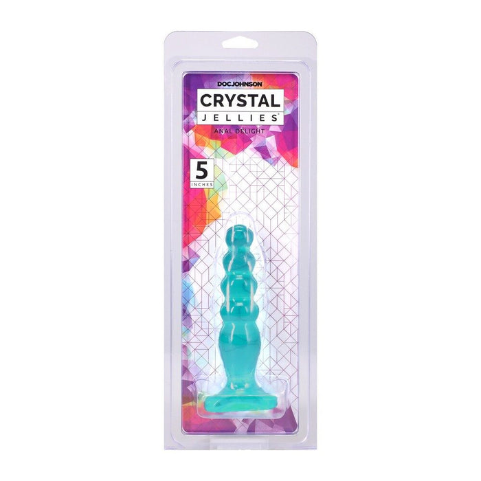 Turquoise silicone anal plug in packaging with 'Doc Johnson Crystal Jellies' branding on a white background