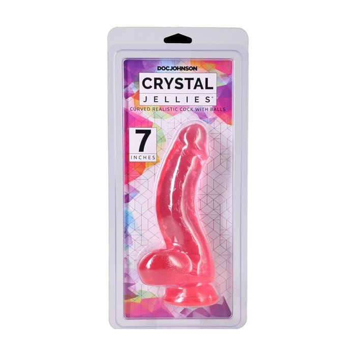 Doc Johnson Crystal Jellies curved realistic cock with balls in a 7-inch blister pack, shown against a plain white background. in pink