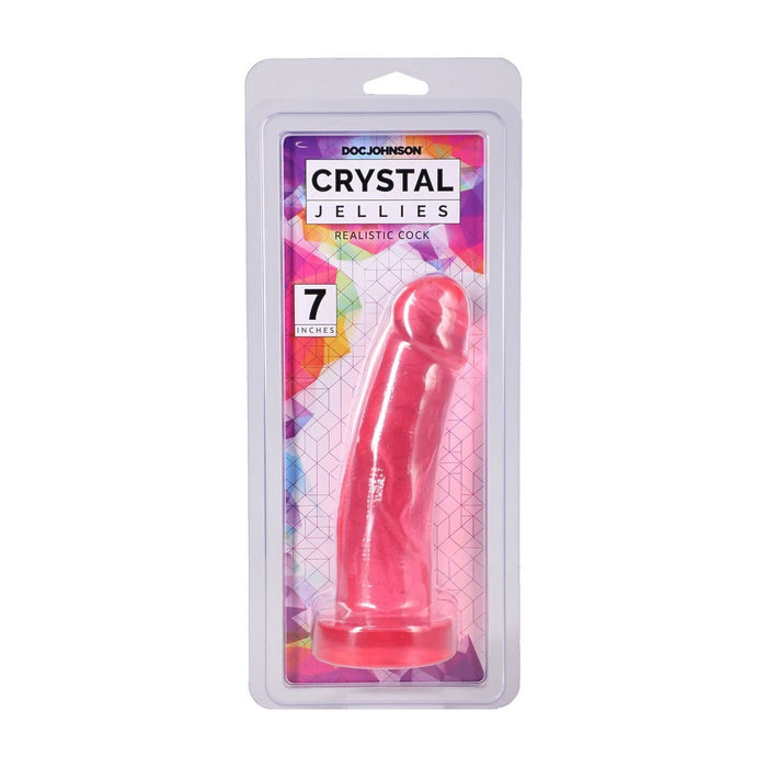 Doc Johnson Crystal Jellies Realistic Cock 7 inch realistic cock in pink translucent gel, shown in its original retail blister packaging against a white background.