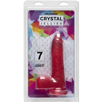 a pink detailed penis shaped dildo with balls and a suction cup, shown in its plastic packaging