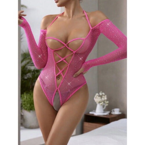 Person wearing a sparkly pink bodysuit in a bedroom setting