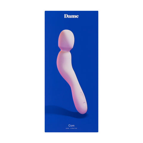 pink wand with a curved handle on box packaging