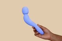 blue wand with curved handle, held in a hand