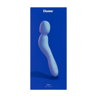 blue wand with curved handle on box cover