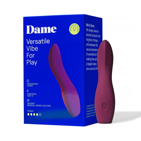 burgundy curved vibrator beside box packaging