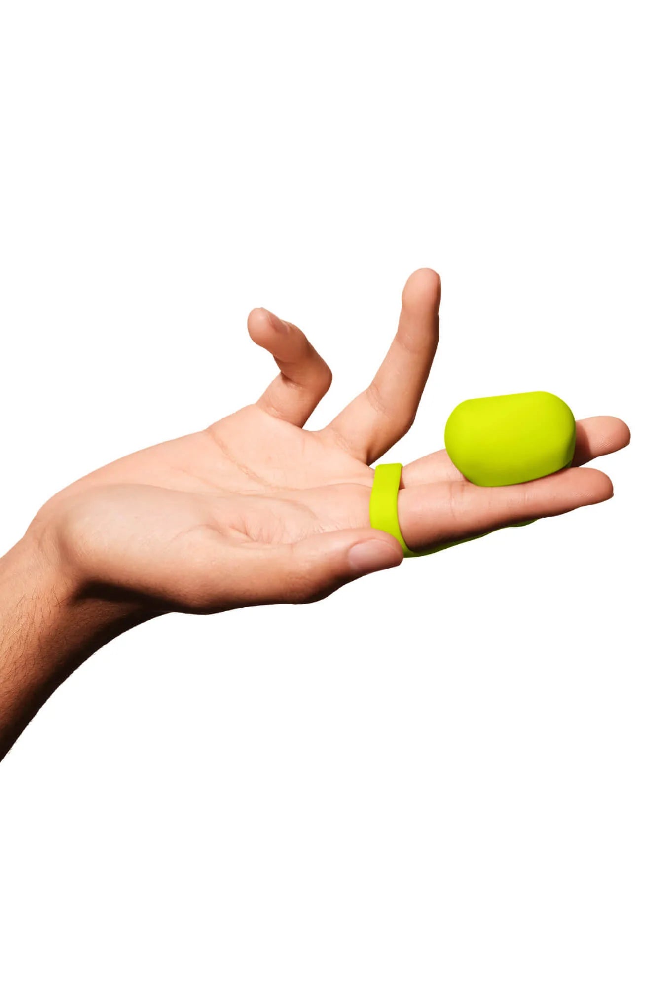 lime green finger vibrator on finger on hand