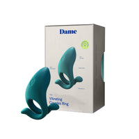 teal cock ring with adjustable ring beside box package