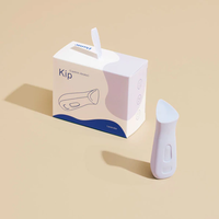 lilac vibrator beside box packaging