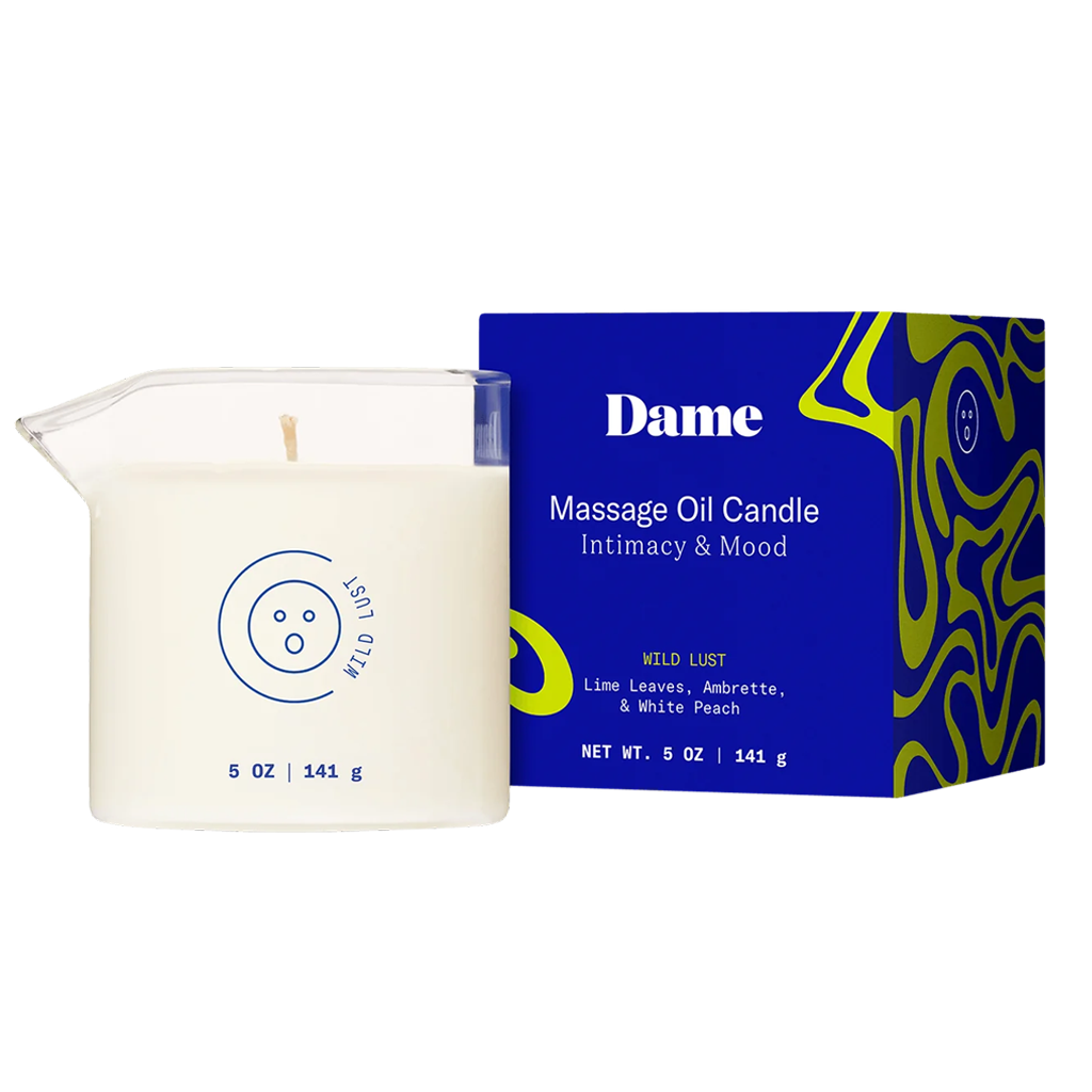 massage candle beside blue box packaging