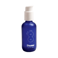 blue pump bottle of dame massage oil