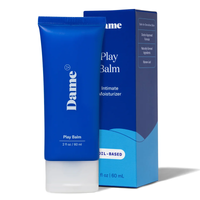 blue tube of damn play balm beside box packaging