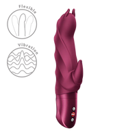 Magenta silicone devil vibrator with electronic components on a white background