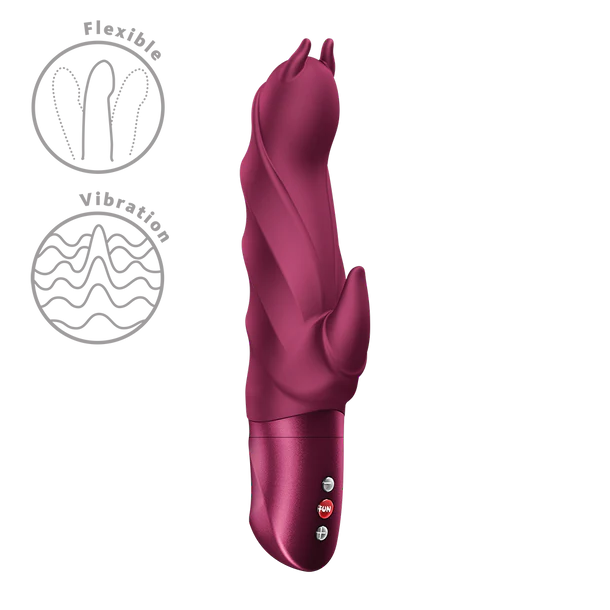 Magenta silicone devil vibrator with electronic components on a white background
