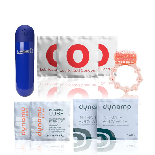 Collection of personal care products including a blue vibrating bullet, lubricants, condoms, and wipes on a white background.