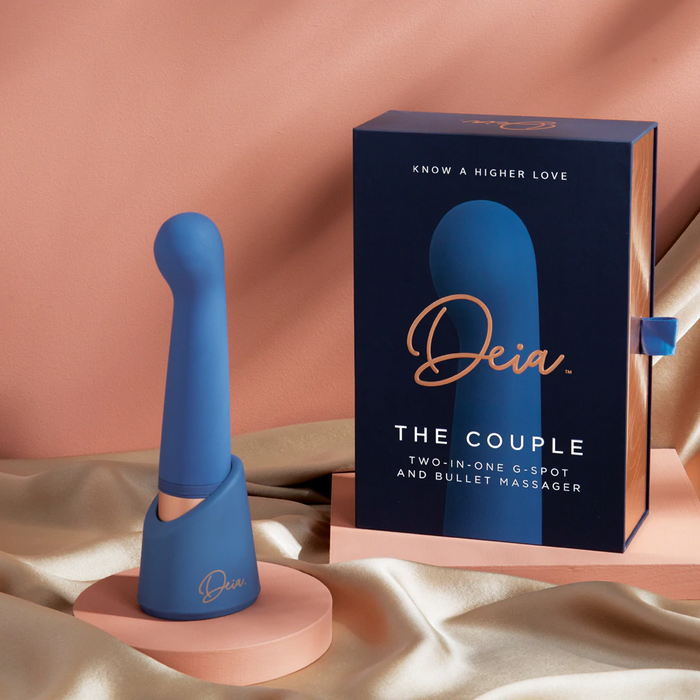 blue vibrator, with bottom base, beside box packaging