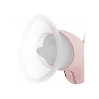 A close-up of a pump device with a translucent white flange and a pale pink body, shown on a clean white background.