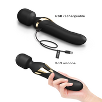2 wands show, one held in a hand. the other showing usb rechargeable