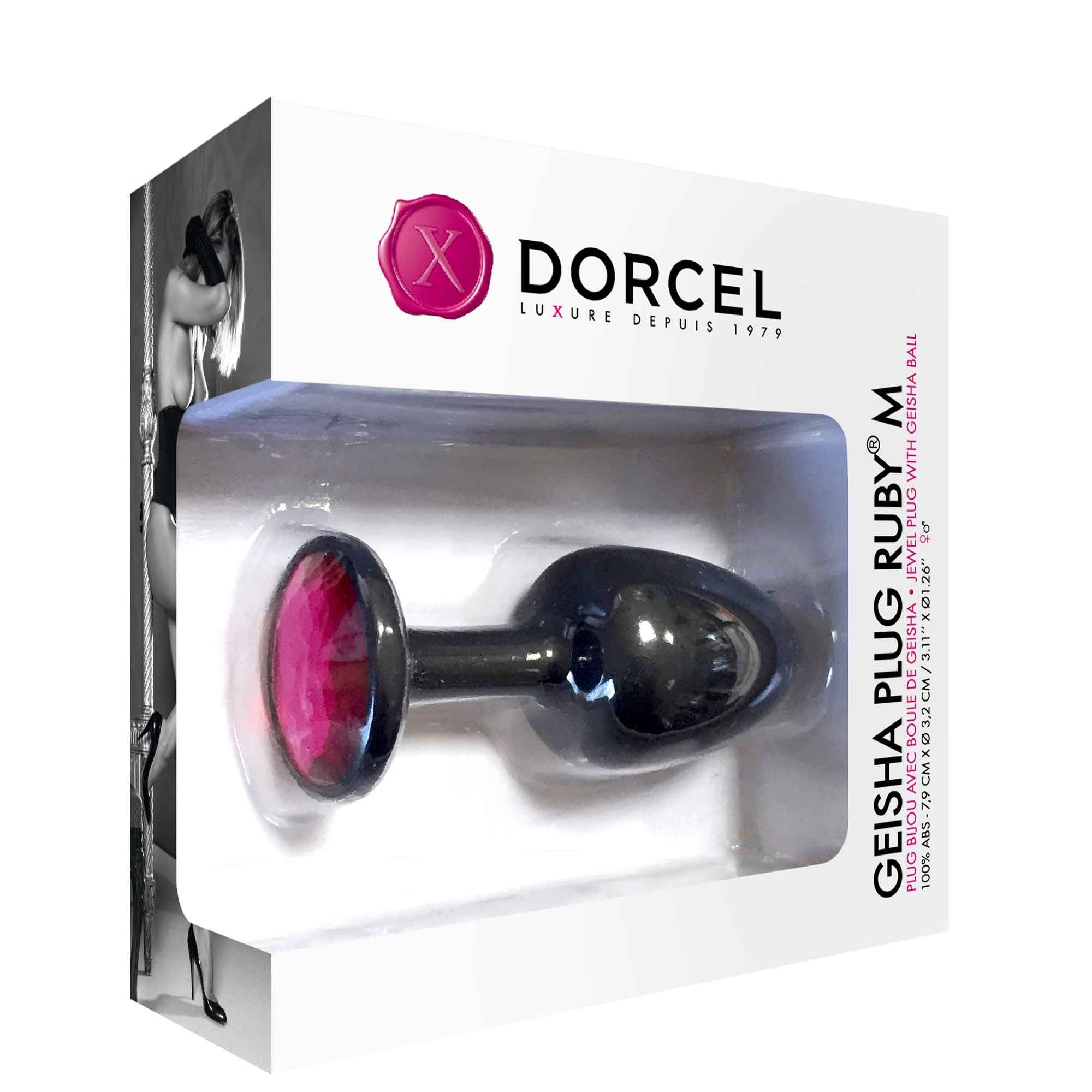 black anal plug with red gem on bottom. on box packaging