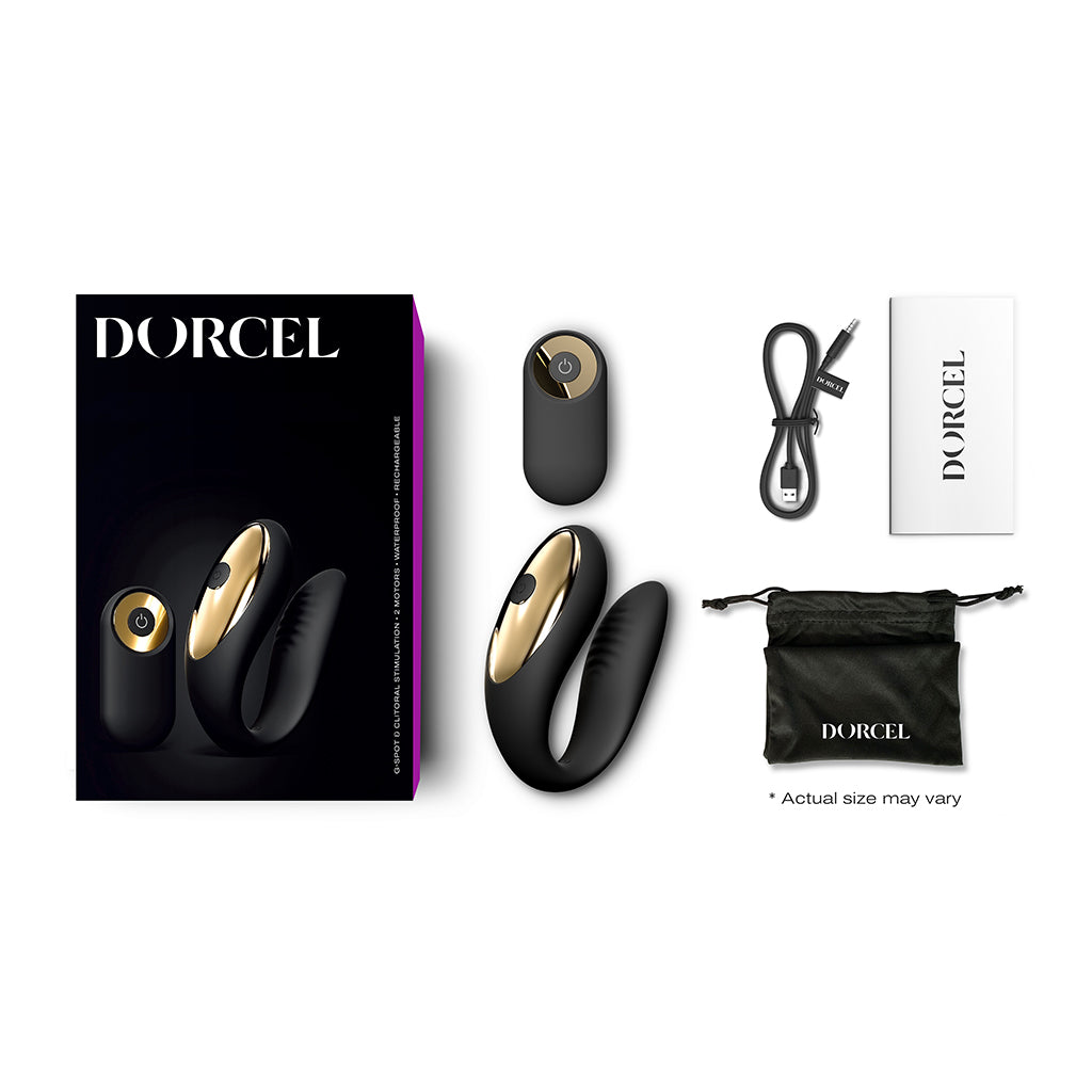 black c shaped vibrator with remote control and accessories beside box packaging