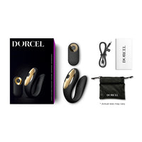 black c shaped vibrator with remote control and accessories beside box packaging