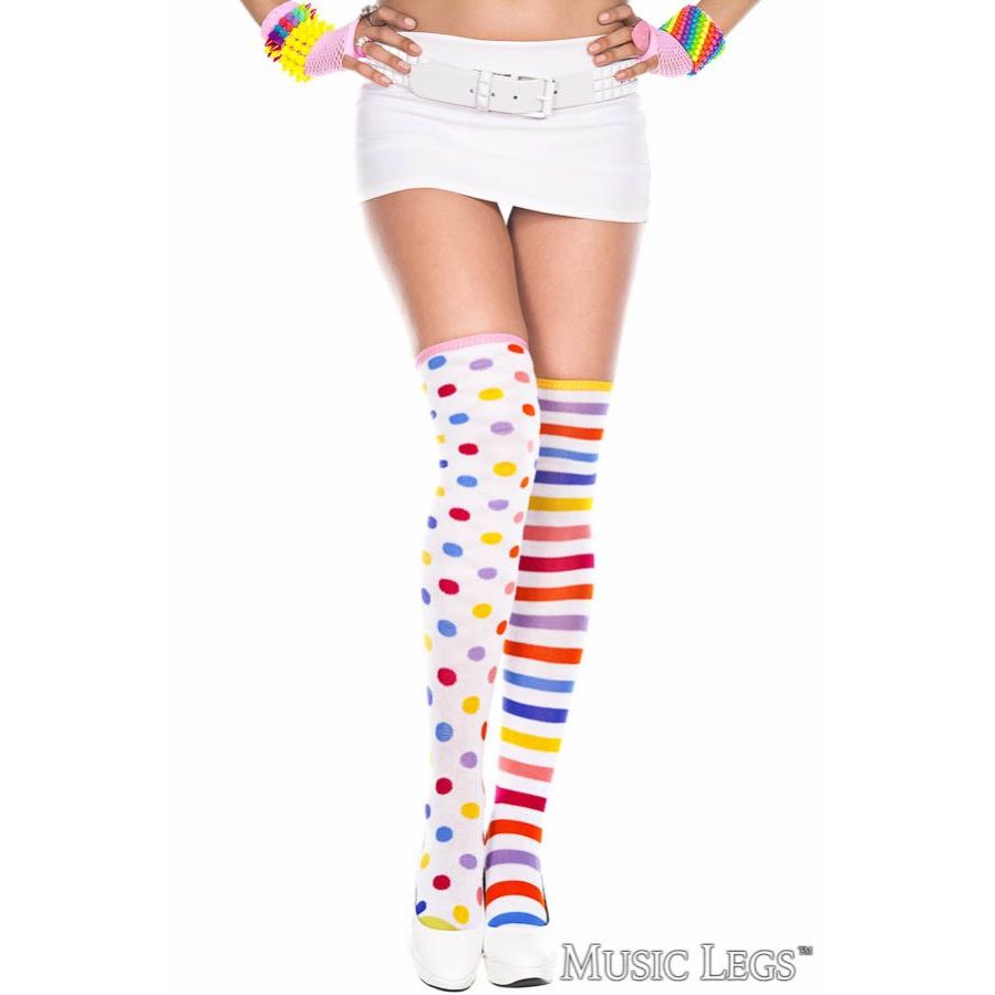 Colorful striped and polka dot knee-high socks worn by a person on a white background.