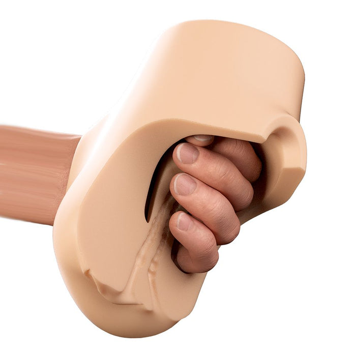 Hand holding a beige Pounders Double Pounder masturbator