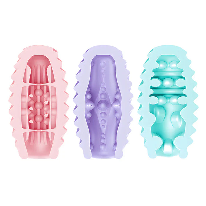 Three pastel-colored silicone masturbator eggs with textured designs on a white background