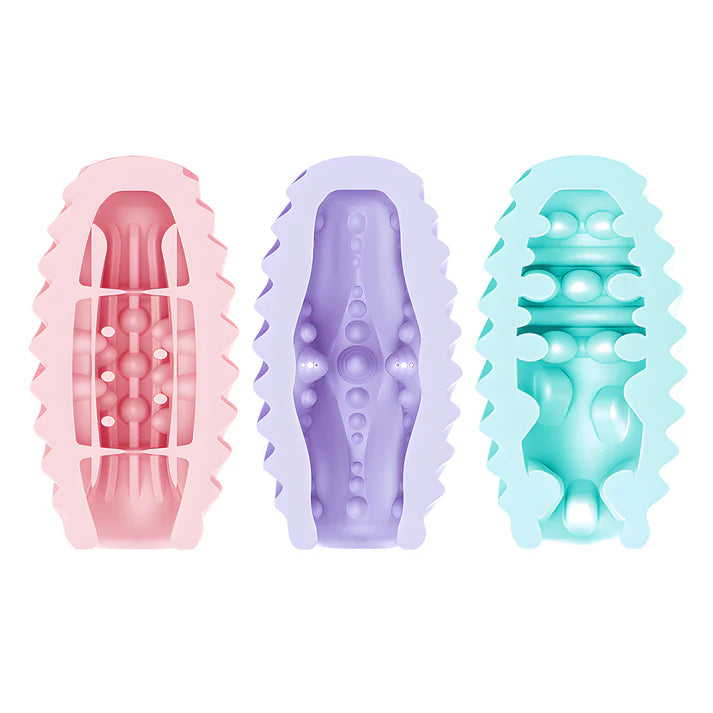 Three pastel-colored silicone masturbator eggs with textured designs on a white background
