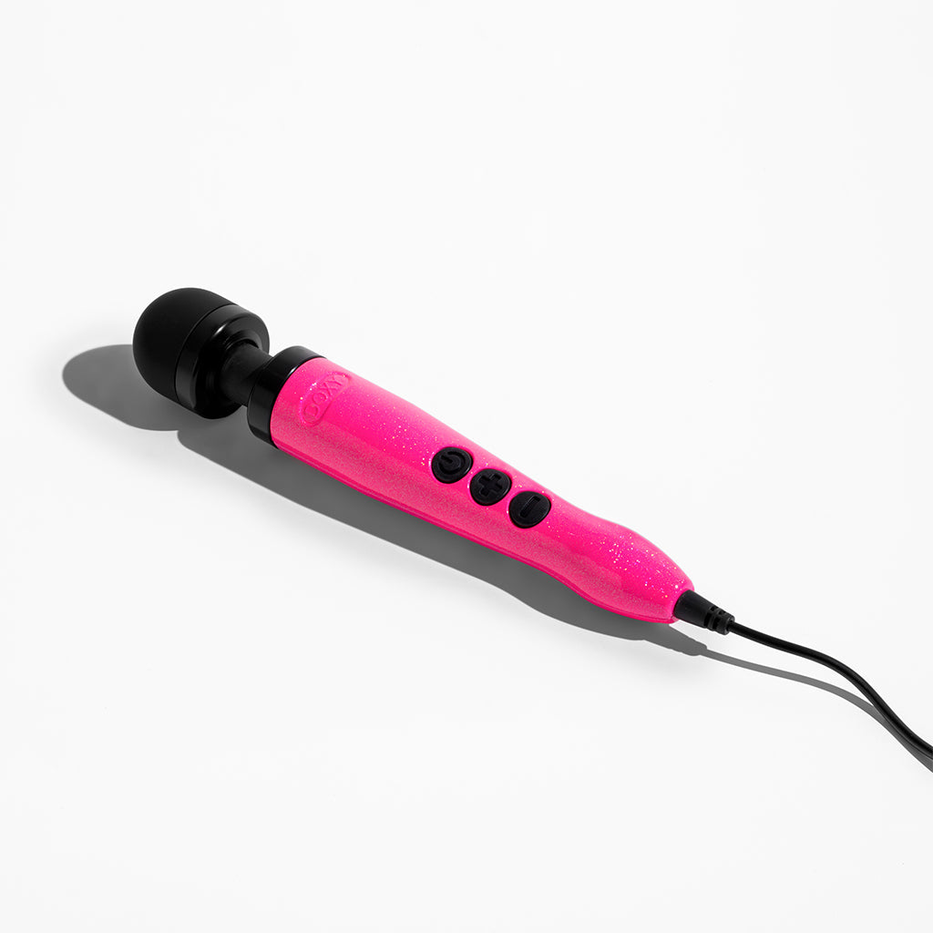 doxy plug in wand with bright pink handle and black head