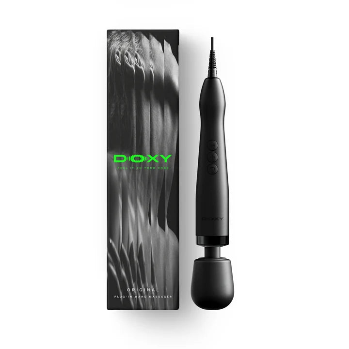 black doxy wand with plug in beside box packaging