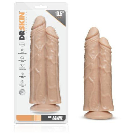 beige 10.5" realistic double dildo penetration toy next to package
