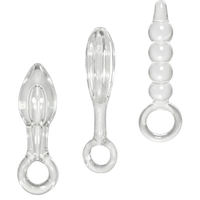 Set of three clear glass anal plugs on a white background