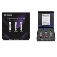 Dr. Tush's 'Hearts of Pleasure Collection' set containing three crystal anal plugs: a spiral, beaded, and bumpy design.